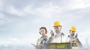 three people with walkie talkie