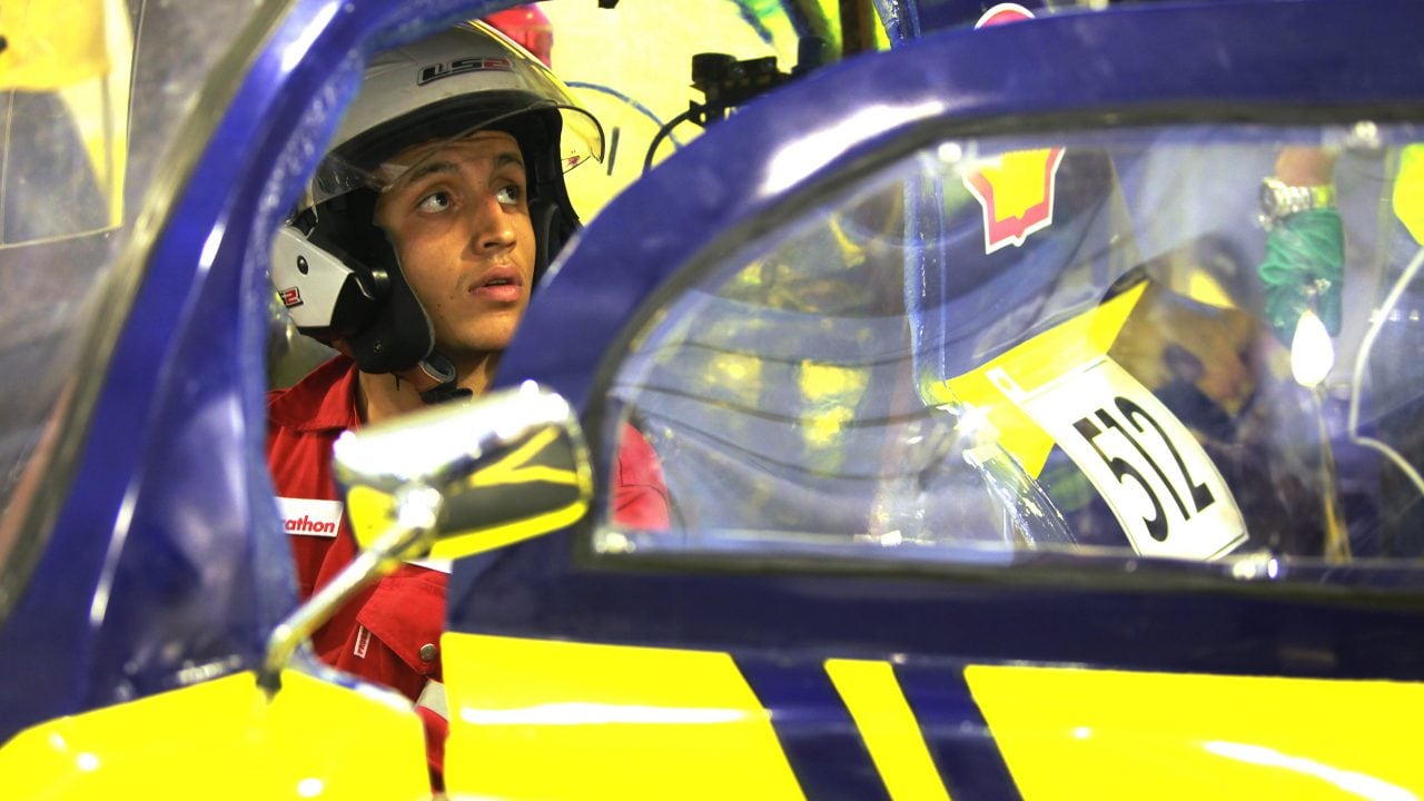 The driver of the Anubis II, #512, a gasoline UrbanConcept vehicle from team CUT Eco-Racing UC at the Cairo University Faculty of Engineering in Giza, Egypt, guides his car through technical inspection during day one of the Shell Eco-marathon Asia in Manila, Philippines, Thursday, March 3, 2016.