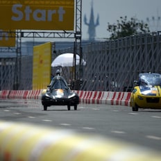The Anubis II, #512, a gasoline UrbanConcept vehicle from team CUT Eco-Racing UC at the Cairo University Faculty of Engineering in Giza, Egypt, runs along the track with the Sapuangin 10, #504, a diesel UrbanConcept vehicle from ITS Team 2 at the Institut Teknologi Sepuluh Nopember in Surabaya, Indonesia, during day three of the Shell Eco-marathon Asia in Manila, Philippines, Saturday, March 5, 2016. 