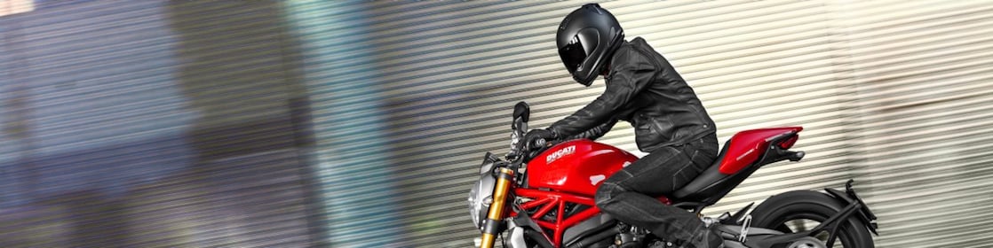 Man riding a bike which is using the Superior Engine Oil For Bikes