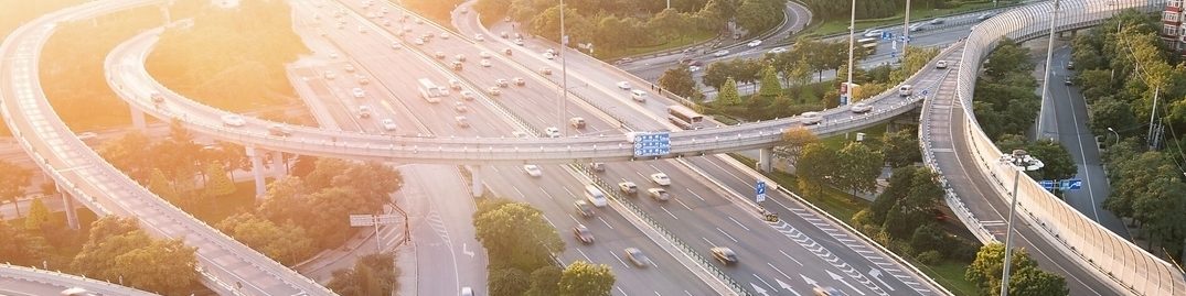Cars driving on a complicated highway infrastructure with over and under passes