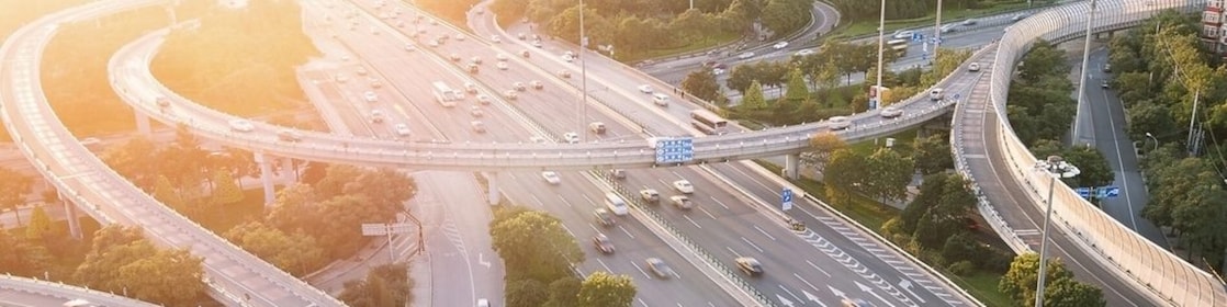 Cars driving on a complicated highway infrastructure with over and under passes